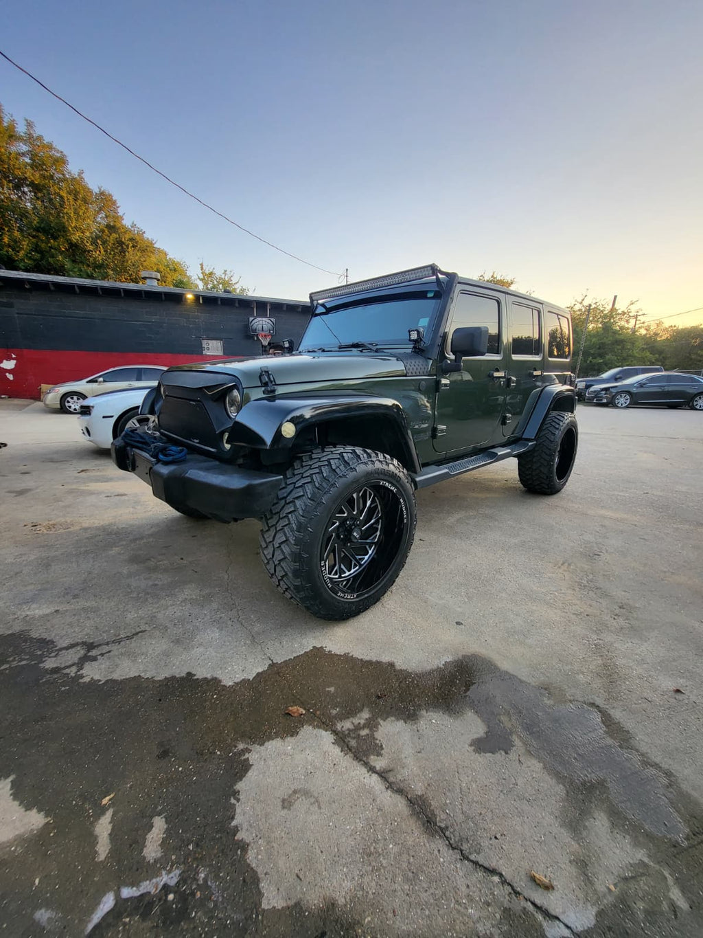 2009 Jeep Wrangler opposite front three-quarter exterior view