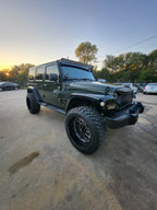 2009 Jeep Wrangler green exterior, front three-quarter view