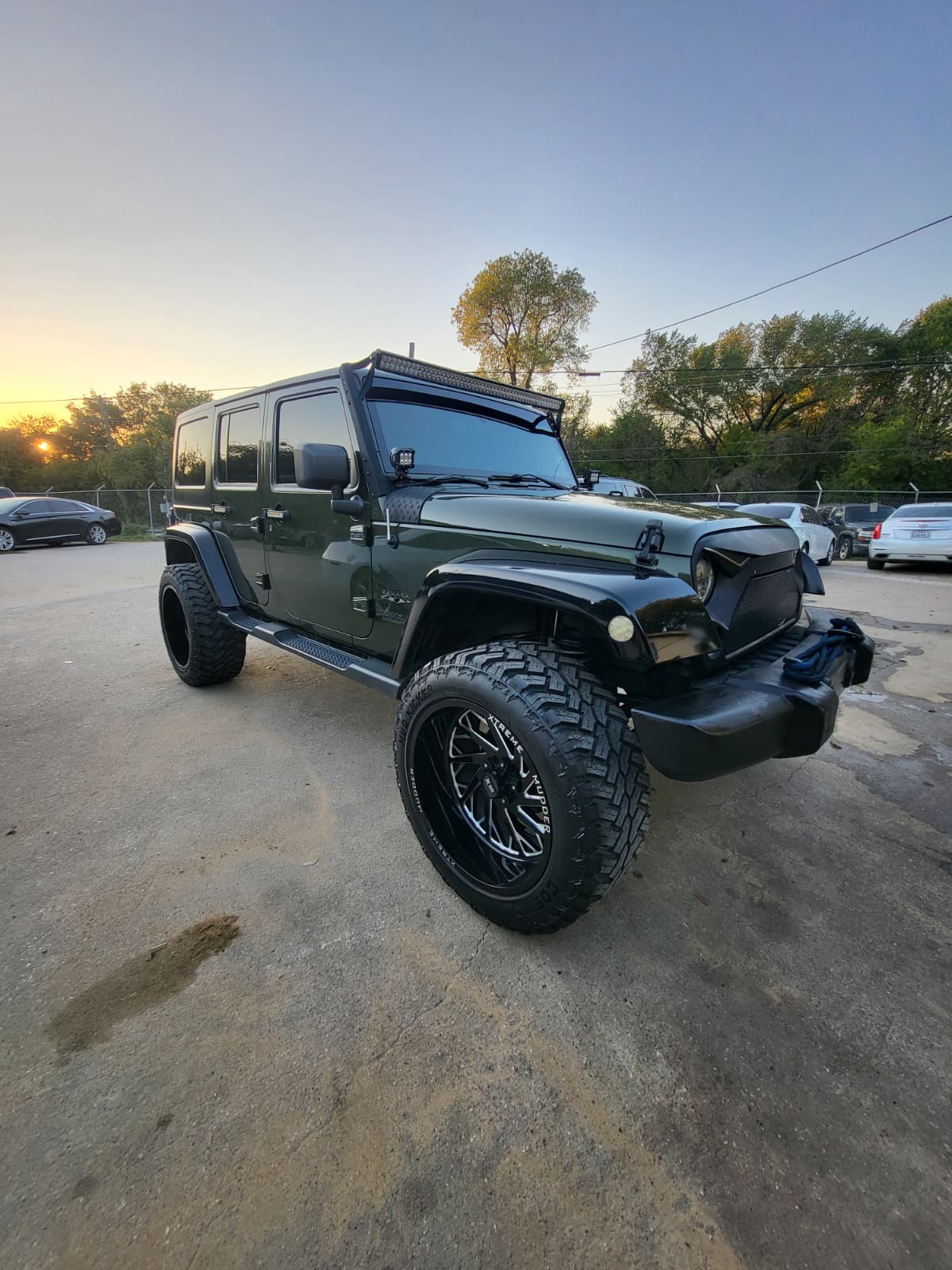 2009 Jeep Wrangler green exterior, front three-quarter view