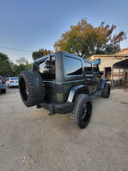 2009 Jeep Wrangler rear three-quarter exterior view