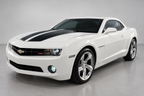 2011 Chevrolet Camaro 2LT in a studio-style setting; background and lighting digitally edited