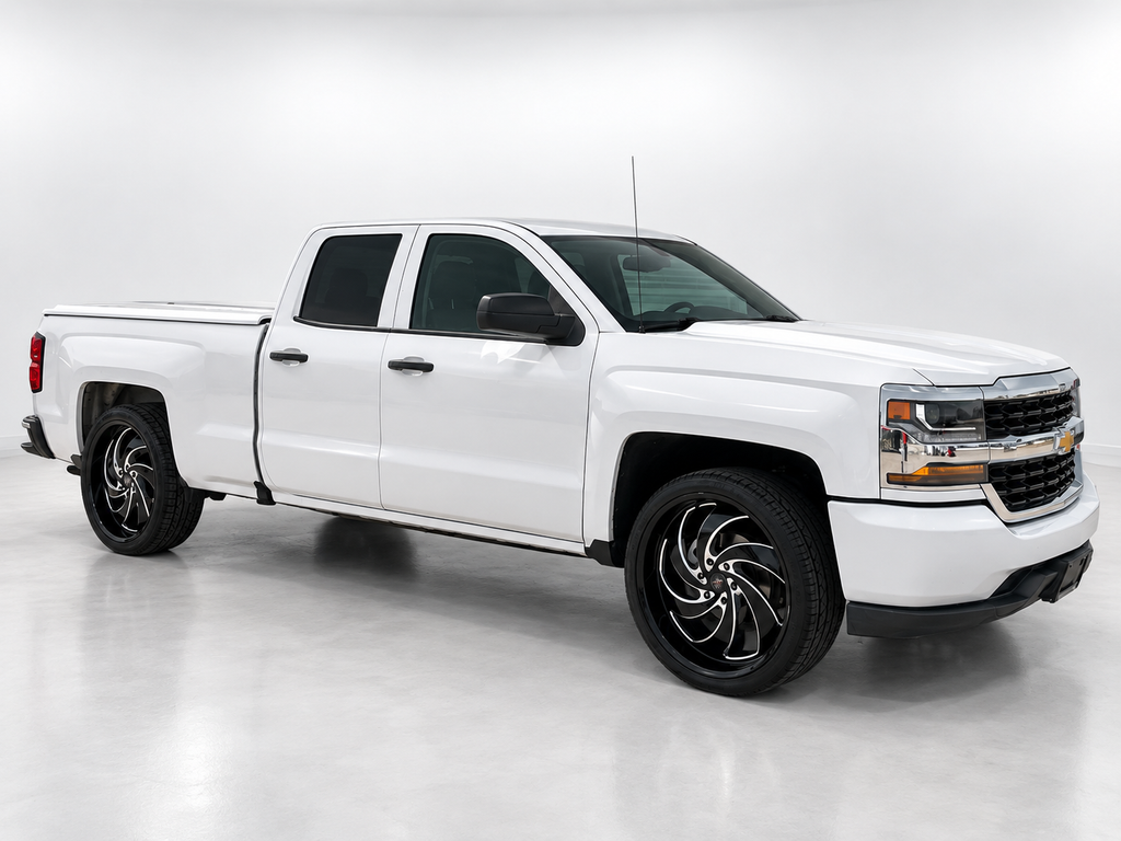 White Chevrolet Silverado with professionally edited studio background