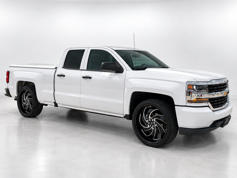White Chevrolet Silverado with professionally edited studio background